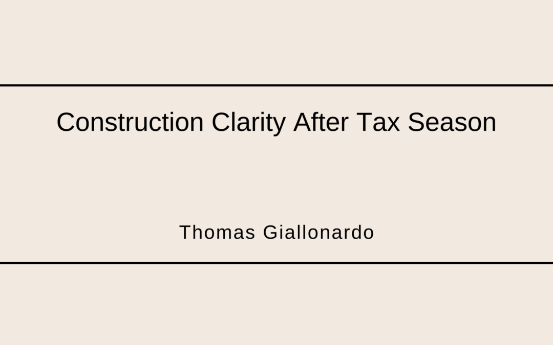 Construction plans, calculator and tax documents used for post tax season planning