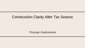 Construction plans, calculator and tax documents used for post tax season planning